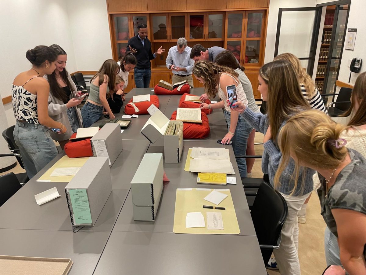 Somerville Scholars examine manuscripts at the Beinecke.